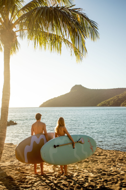 couple paddleboarding